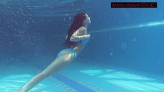 Tattooed teen Mia Ferrari gets naked in the pool