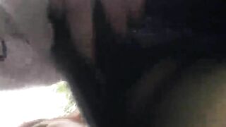 Naughty mom pulls her T-shirt up on walkies to expose her gorgeous breast and puffy nip as she slips n slides in the mud