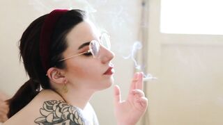 Naked Tattooed Model Smokes Camel s100 cigarette